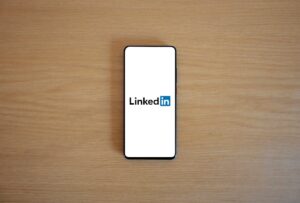 LinkedIn wins news bargaining reprieve as Microsoft boss lands in Sydney