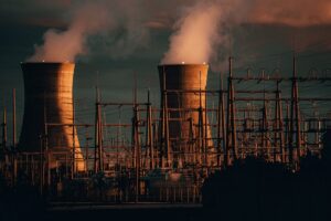 Liddell power station chimneys come crashing down in controlled explosion