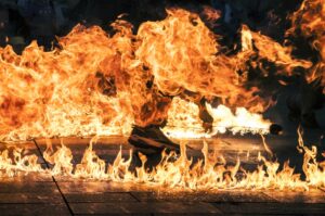 Man dragged from flames after driver allegedly hit multiple cars