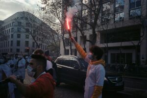 Protesters torch vehicles, block roads over Belfast stabbing