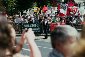 Protests erupt in Belfast after stabbing attack, homes, cars and bus set on fire