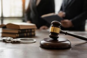 Criminal complaint filed in share-reporting case