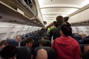 Passenger nearly 'sucked' out window after mid-air scare; video shows damaged engine