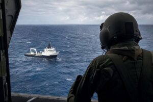 Search for 17 missing crew after c