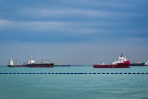 Live: Oil prices surge on latest US-Iran flare-up, ASX slips as housing slump continues